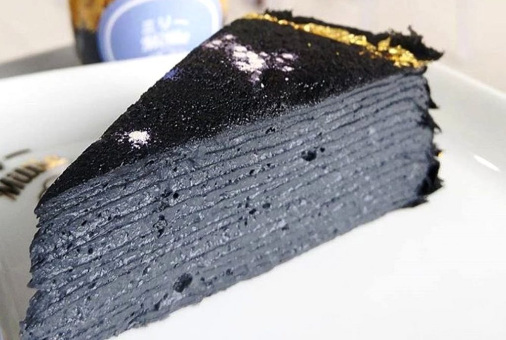 Charcoal “Stardust Crepe Cake at Millie Desserts